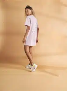 Lady wearing Sun and Sand Sports clothes